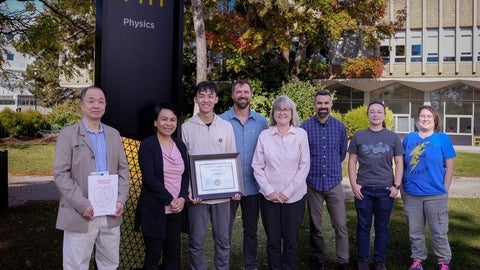 Zander Li with Physics and Astronomy faculty.