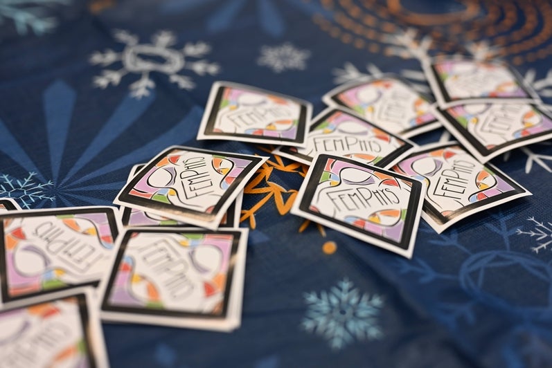 Fem Phys swag on a table.