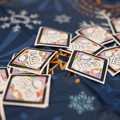 Fem Phys swag on a table.