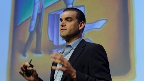 Farnoud Kazemzadeh appears to be giving a speech.