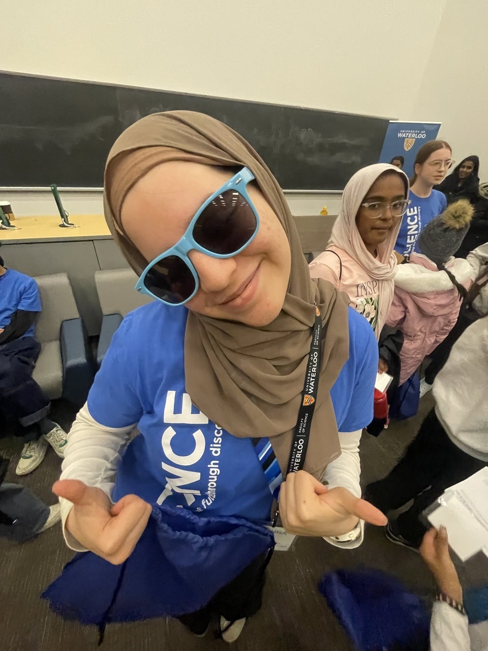 Bushra Almalki giving two thumbs up.