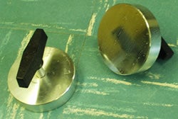 Photograph of metal pucks