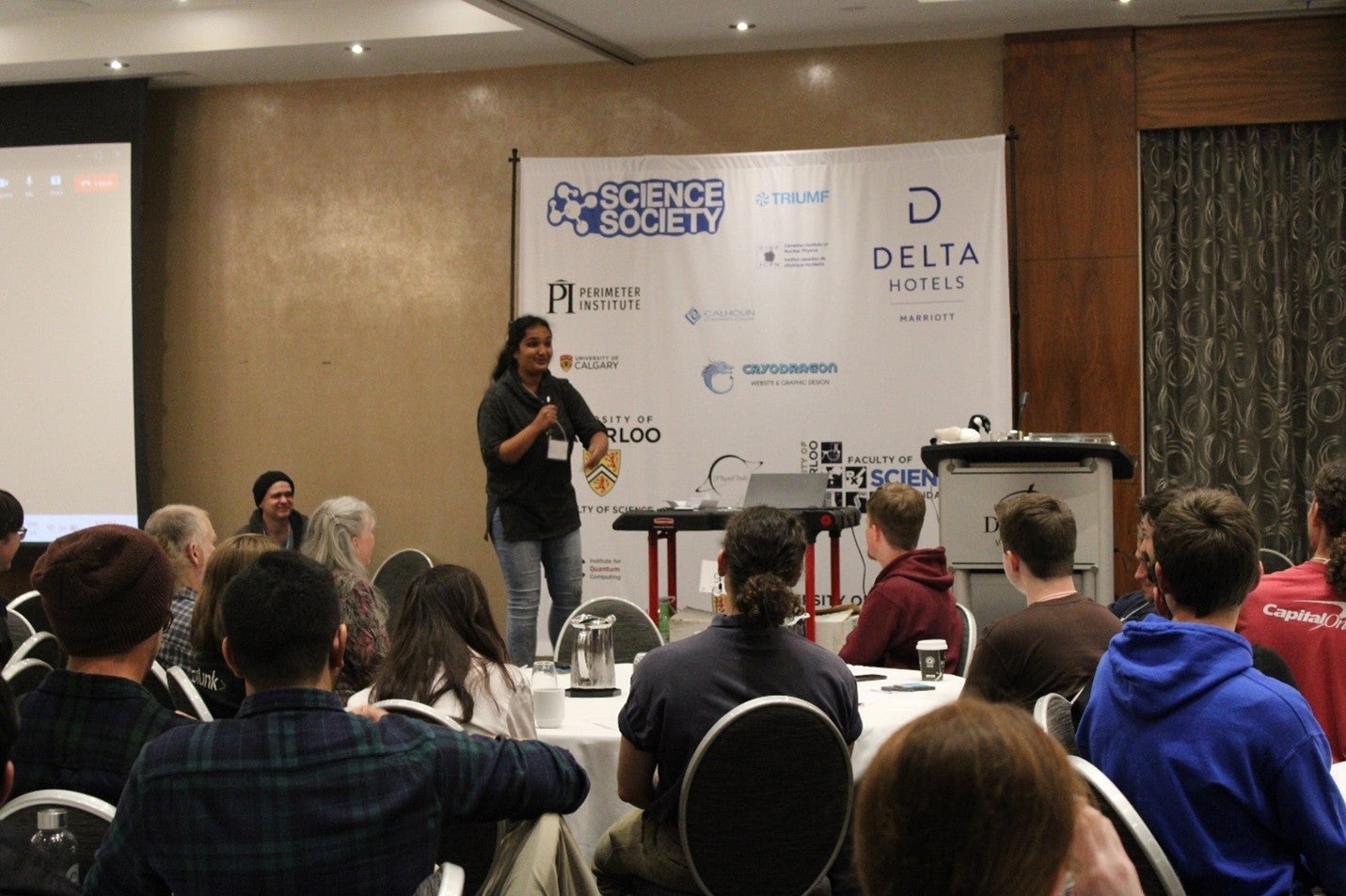 Urja speaking at the conference.