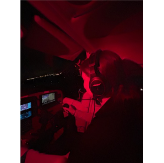 Chloe Muhl in a dark room