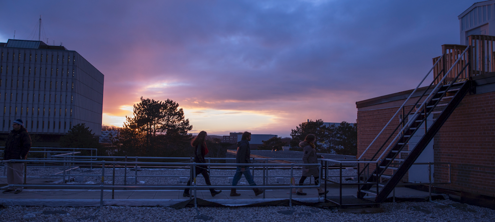 Visitors heading to the upper deck of the Physics Building rooftop