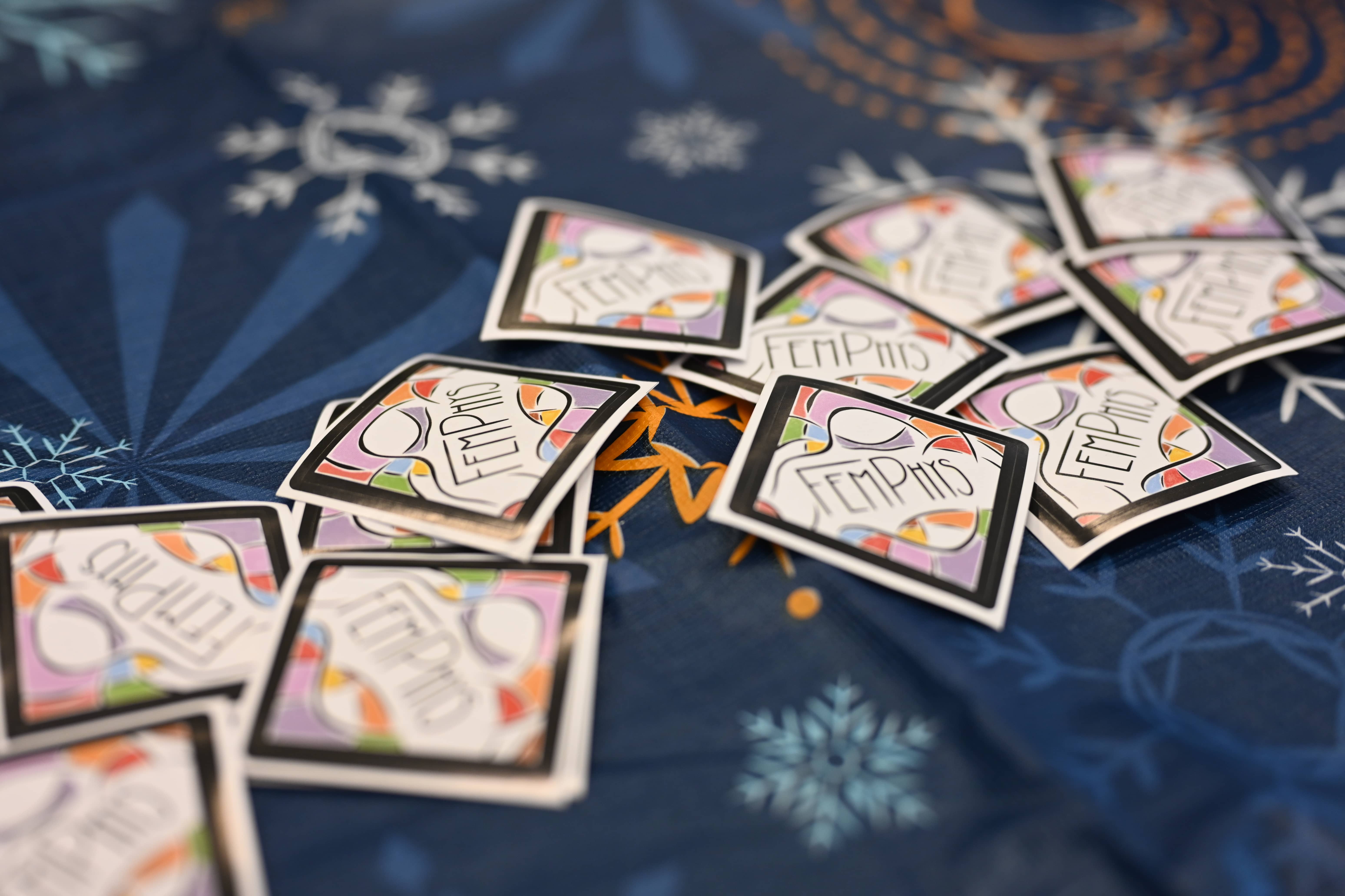 Fem Phys swag on a table.