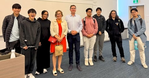 Group photo including Dorothy McCabe, Dr. Brian Doucet and PLAN 100 students