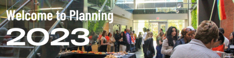 A wide shot of the EV3 Atrium with Welcome to Planning Ceremony attendees.