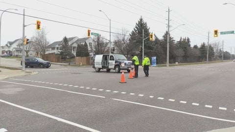 Police investigate a hit and run at the intersection of Ottawa Street South and David Bergey Drive in Kitchener on Dec. 29, 2023.