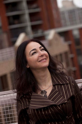 Headshot of School of Planning faculty member Dr. Luna Khirfan