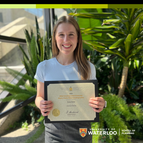 MES Student Emma Borho stands with award for the 2024 Dillon Consulting Ltd Scholarship