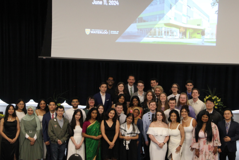 Overhead group photo of the Class of 2024 attendees