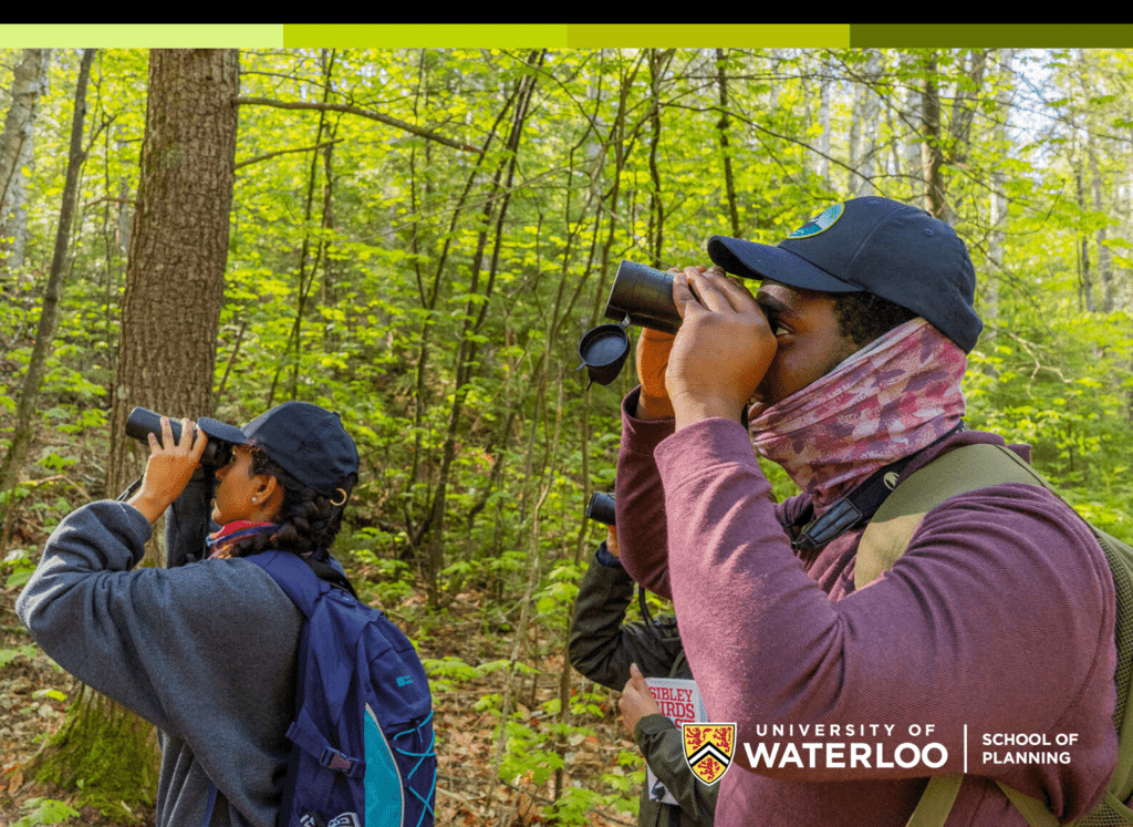 University of Waterloo Students Banujah Theivendrarajah (Environment & Business) and Dami Awoleye (Planning) birdwatch on a FREED-hosted field experience in Algonquin.