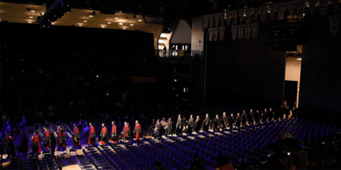 graduates walking into convocation