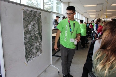 Student discussing site plan