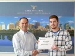 Logan Romphf receiving the 2015 ESRI Canada GIS Scholarship