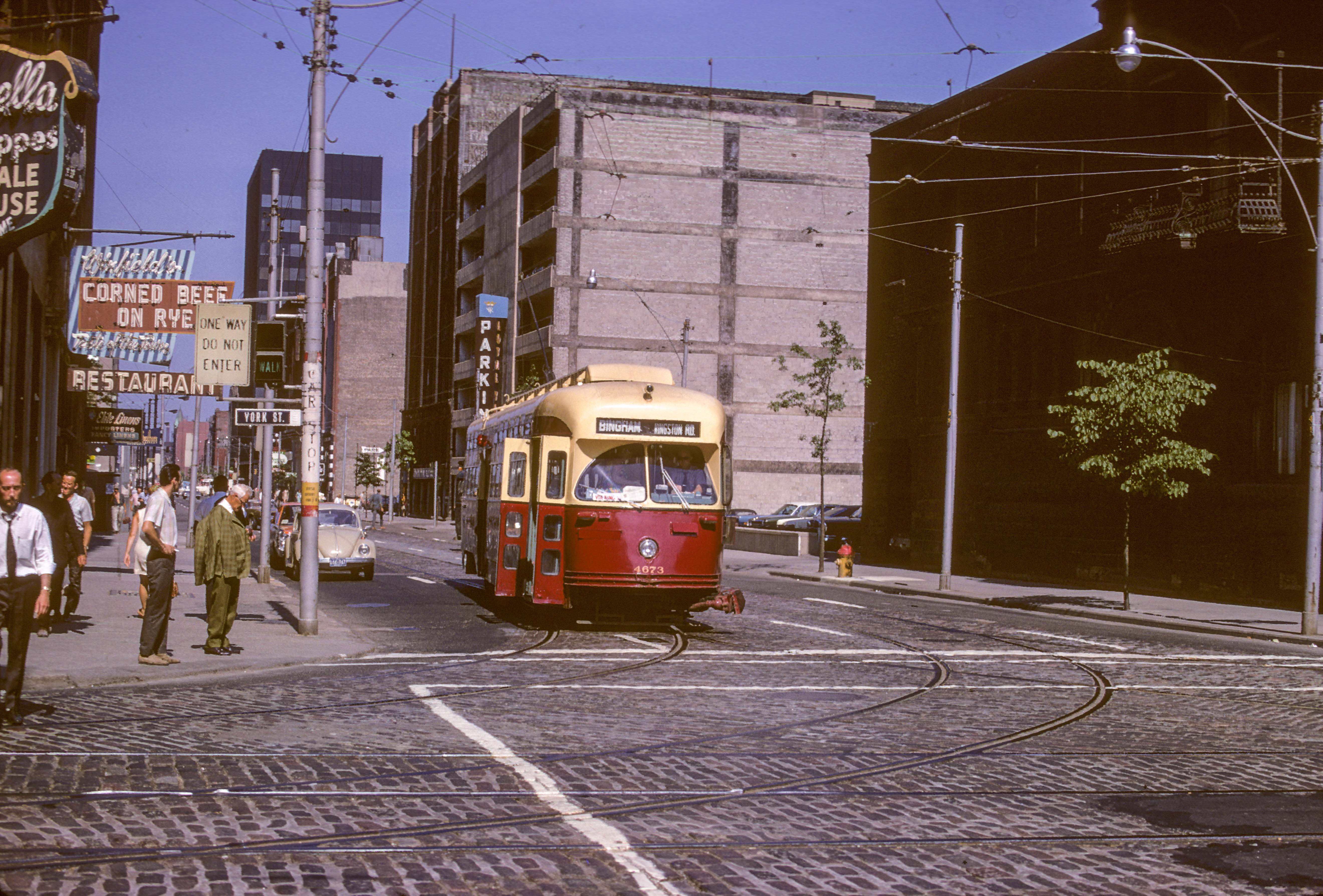 Toronto WB to NB streetcar pictured at Wellington and York on July 15, 1969.