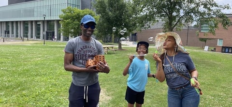 Family blowing bubbles