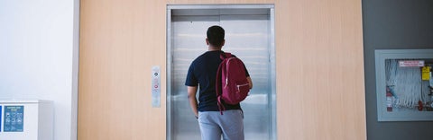  Student waiting for elevator 