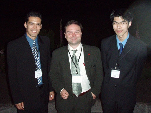 CIRP High Performance Cutting (HPC'06) Conference Vancouver, June 2006. Three people standing in suits.