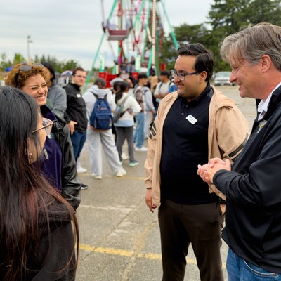 President Rosehart talking to students at the WUSA Carnival