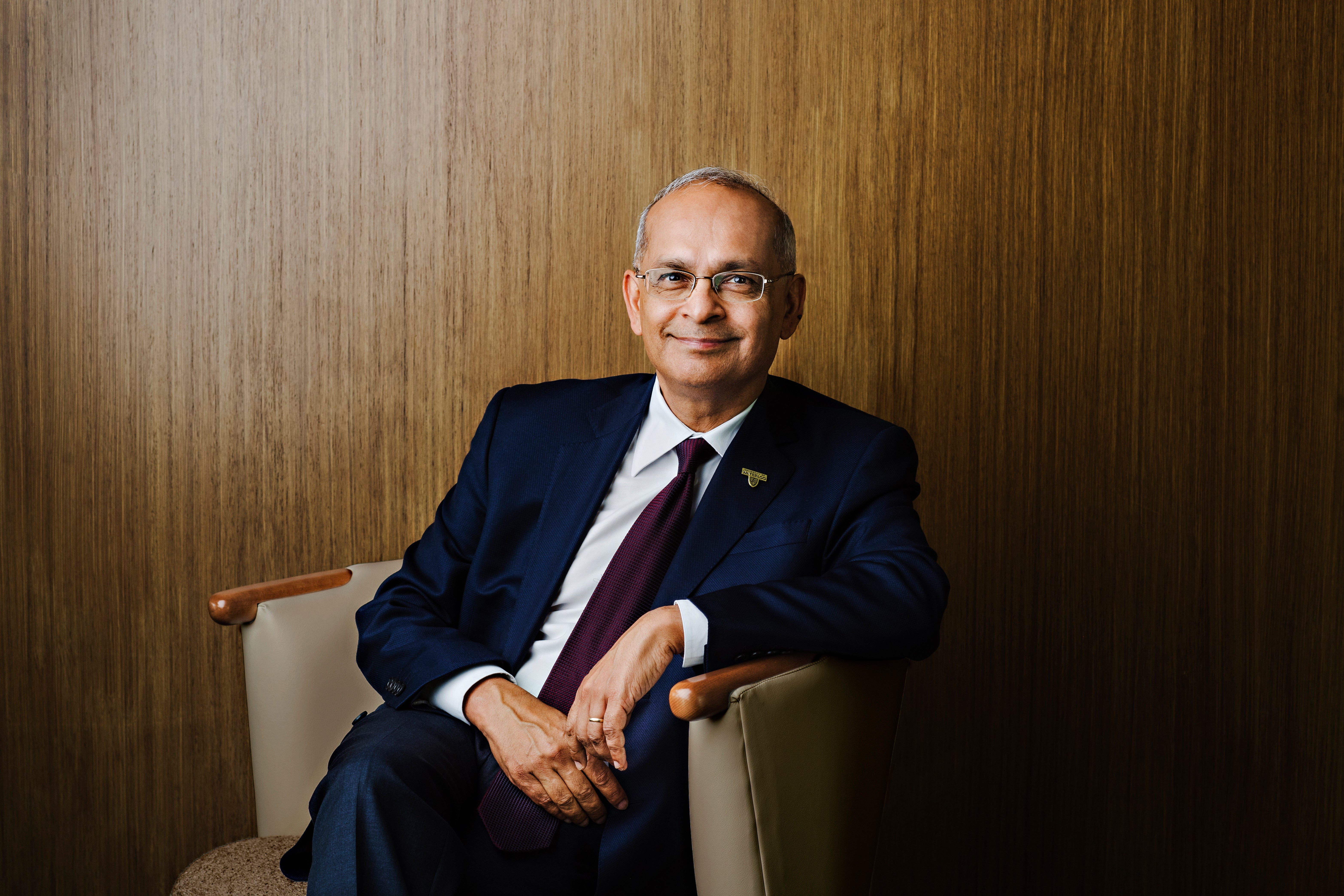 Vivek Goel seated and smiling at camera