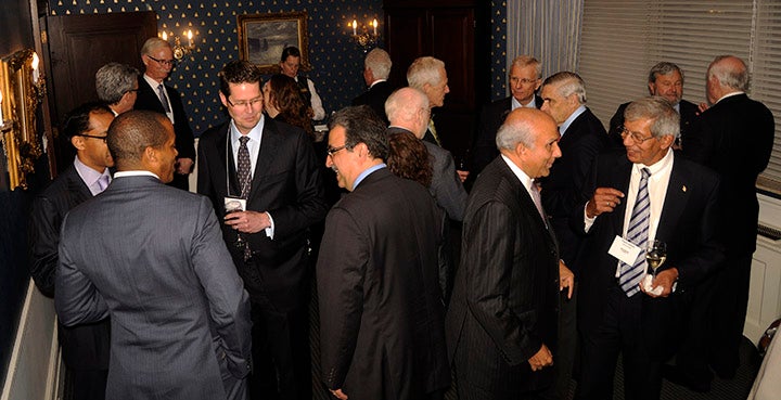 Guests mingle at the reception prior to dinner.