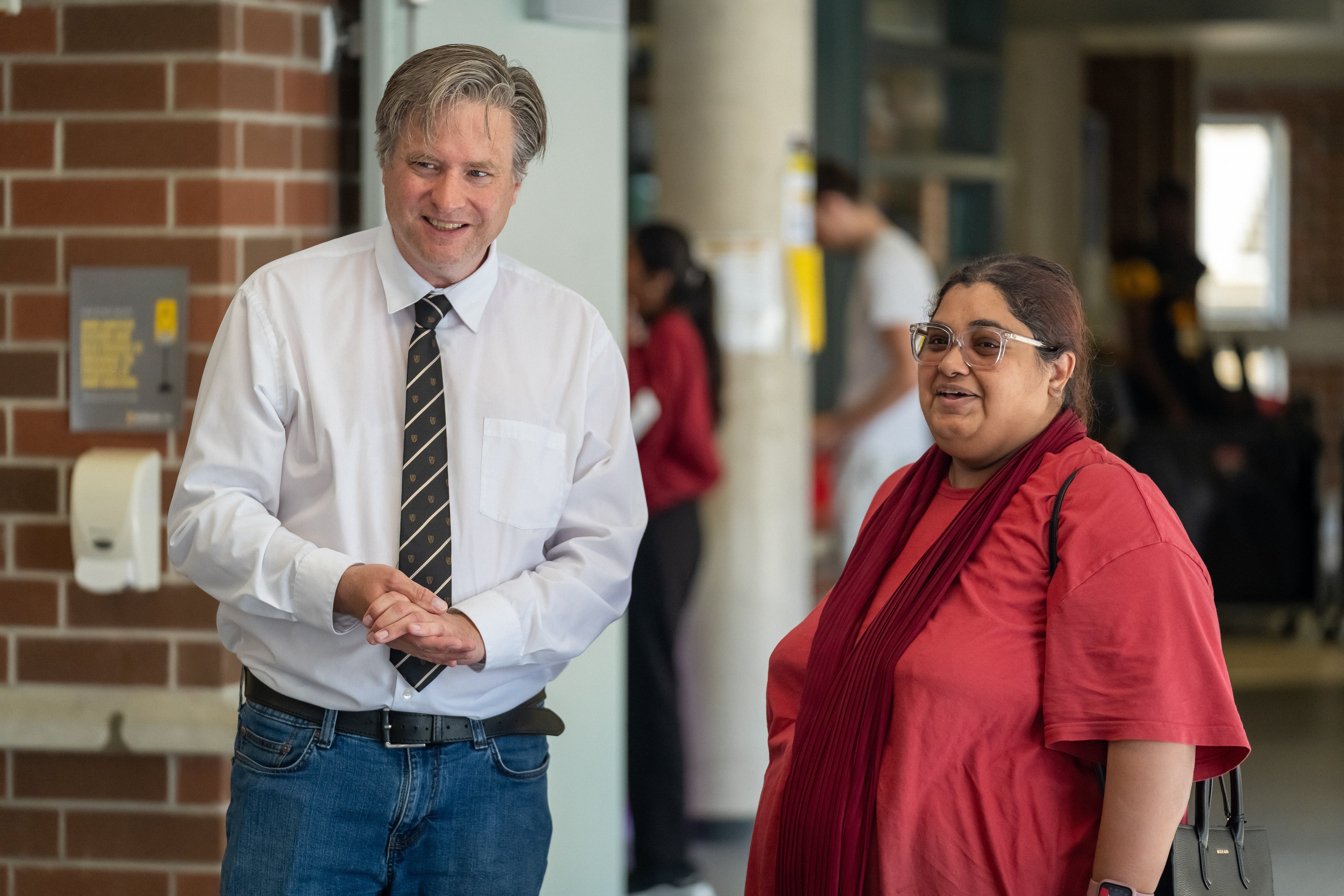 Bill chatting with a lady