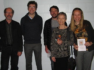 Group photo of Heather and four Psych faculty 