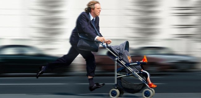 father running fast, while pushing baby buggy
