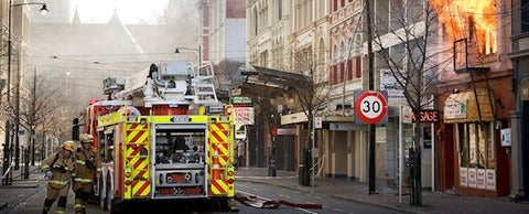 Firefighters in New Zealand fighting fires after an earthquake