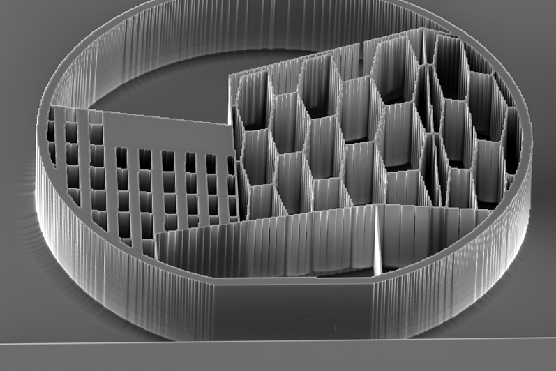 QNFCF logo etched 100 µm deep into Si