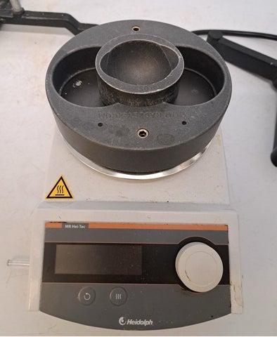 Hot plate inside fume hood with a heating adapter to fit a 50 millilitres round bottom flask