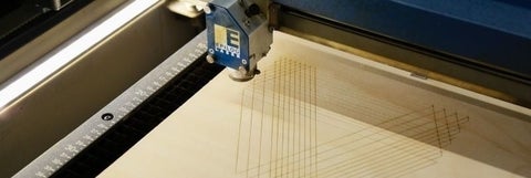 Picture of laser cutter performing a cut