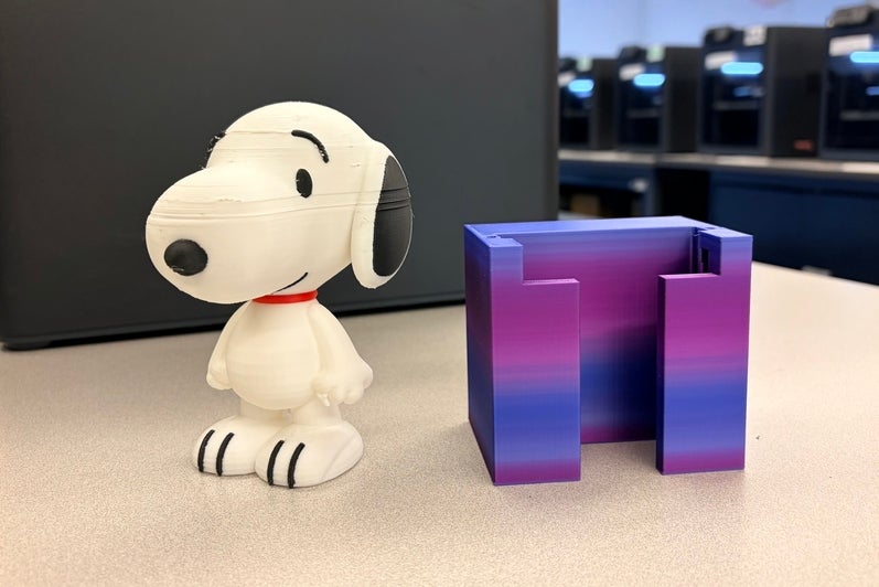 Example of snoopy figurine and multicolour block