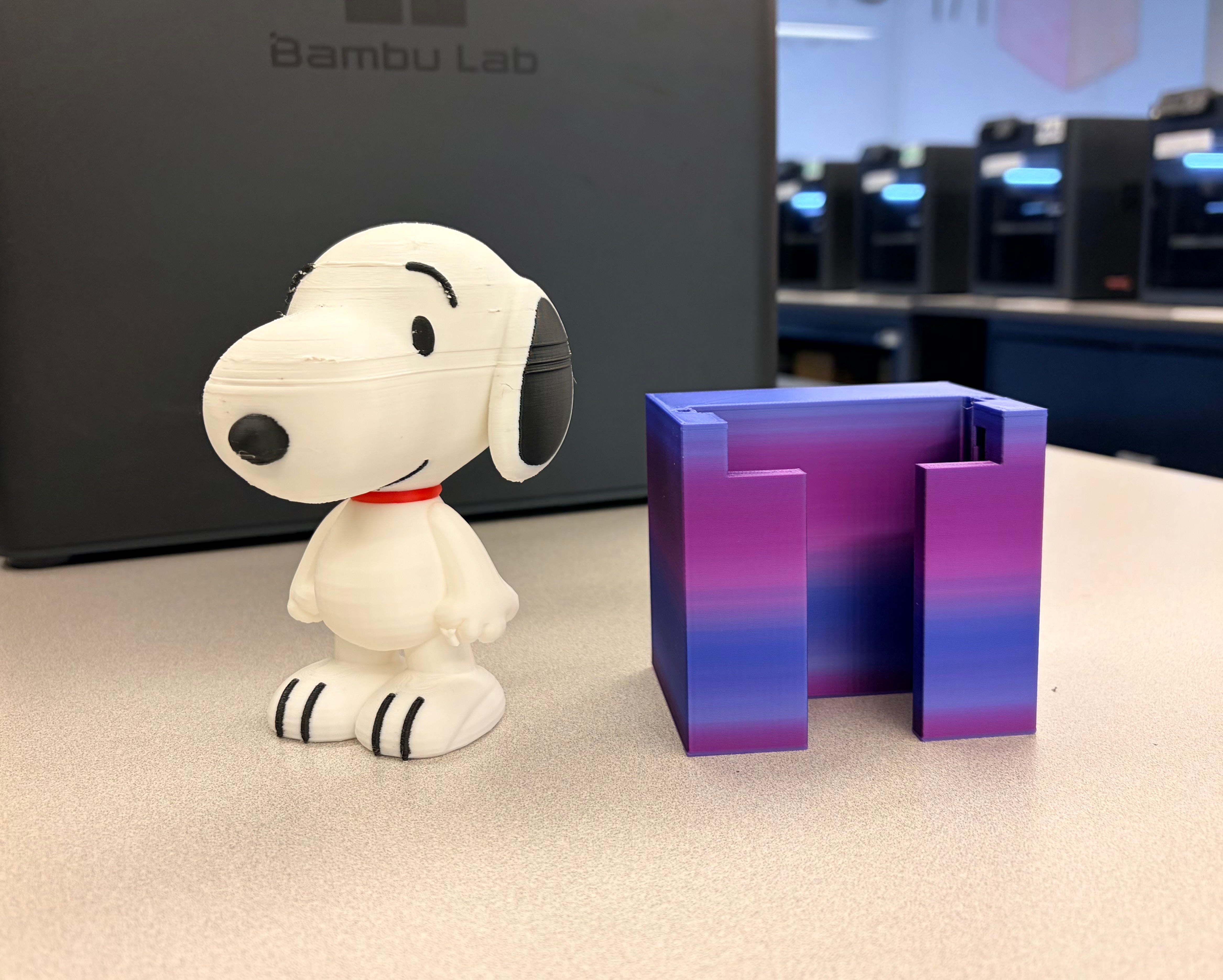 Example of snoopy figurine and multicolour block
