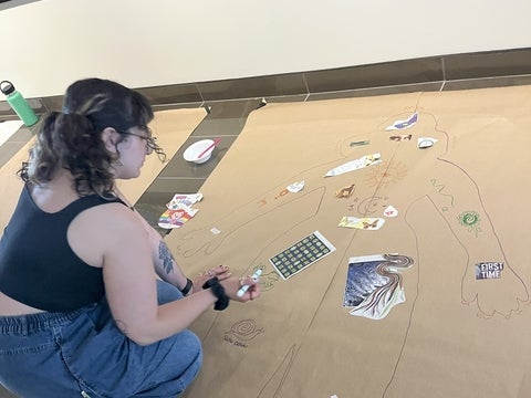 A student working on their body map.