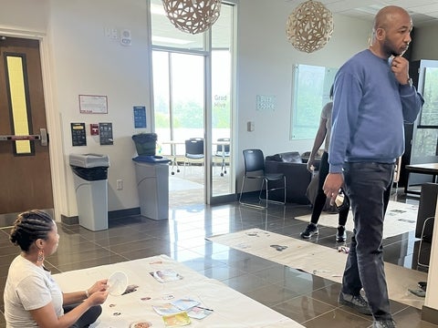 A student in the process of body mapping.