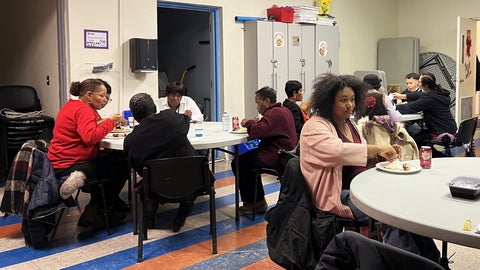 Everyone enjoying their dinner.