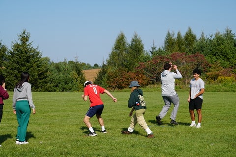 students playing games on the grass