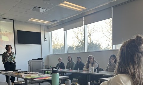 Jasmine Vanstone listening to an audience member speak.