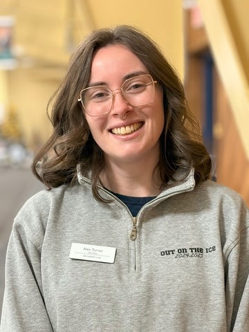 Young woman smiling.