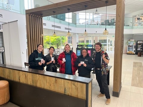 Dr. Markus Harwood-Jones and Dr. Kimberly Lopez with students who attended the Writing Possibility event.