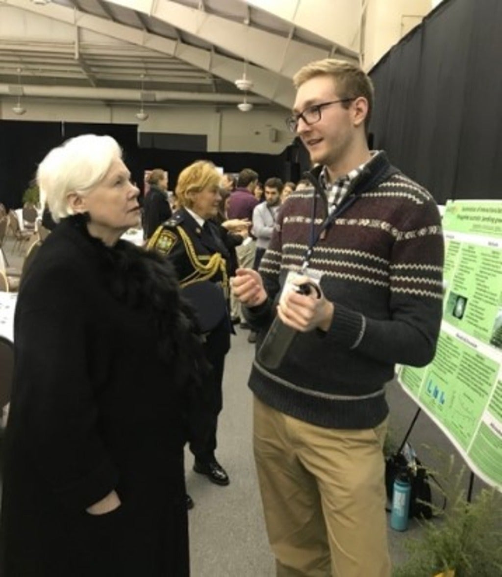 Andrew MacDonald speaking with Elizabeth Dowdeswell