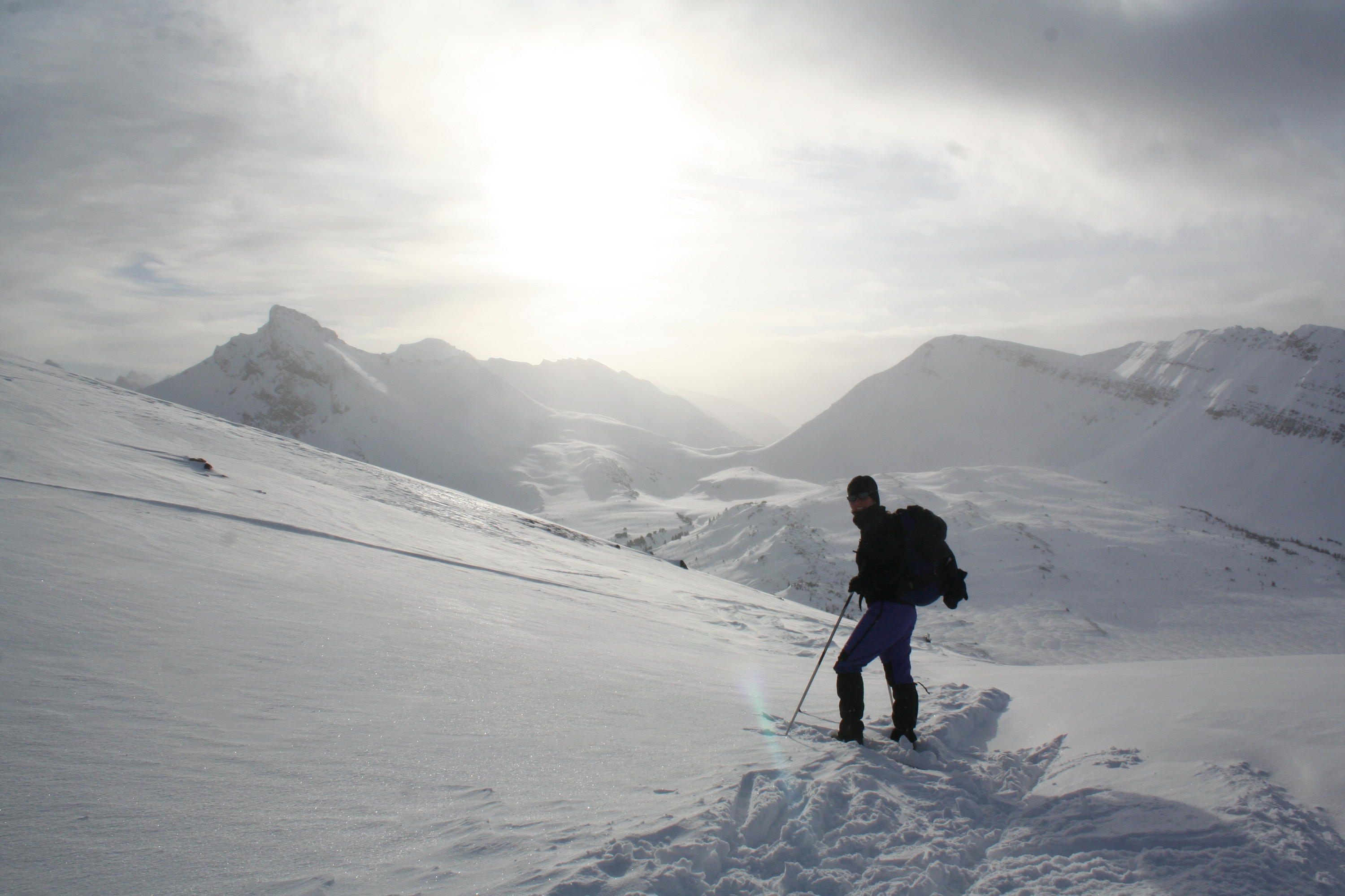 silouhette of Dawn on a snowy mountain in Canada