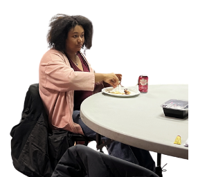 Someone eating at the dinner.