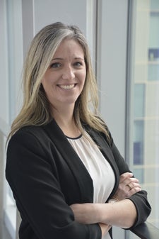 Headshot of Rhea Johnson.