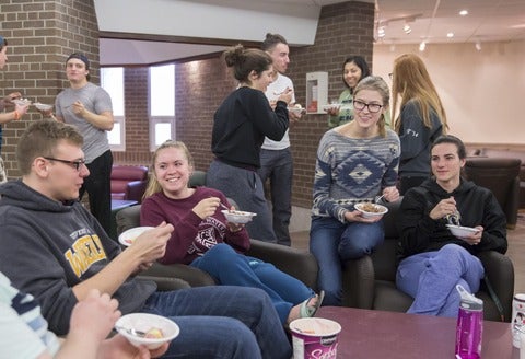 Students eating at a UWaterloo social event.