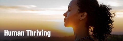 A woman in profile against a sunset background with the words “Human Thriving.”