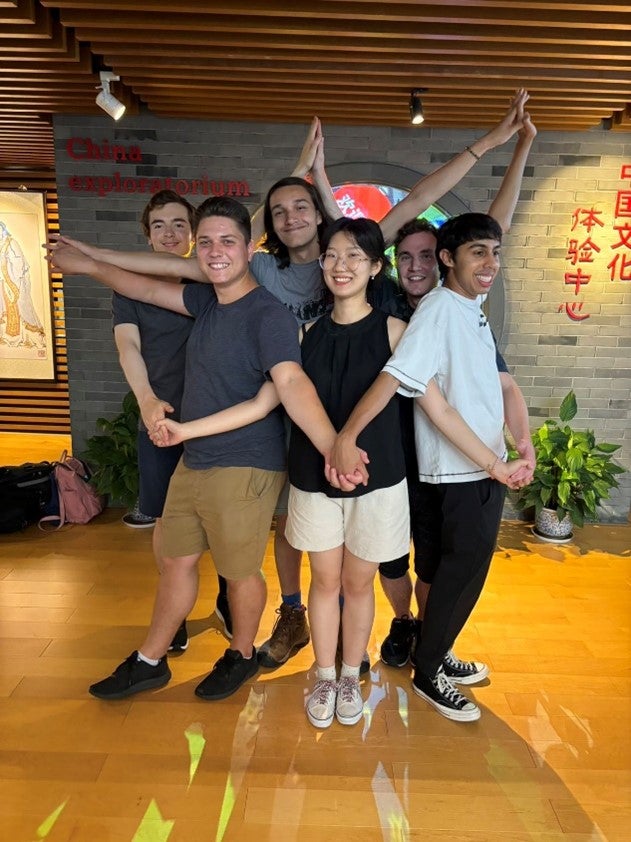 group of students making a start with their arms